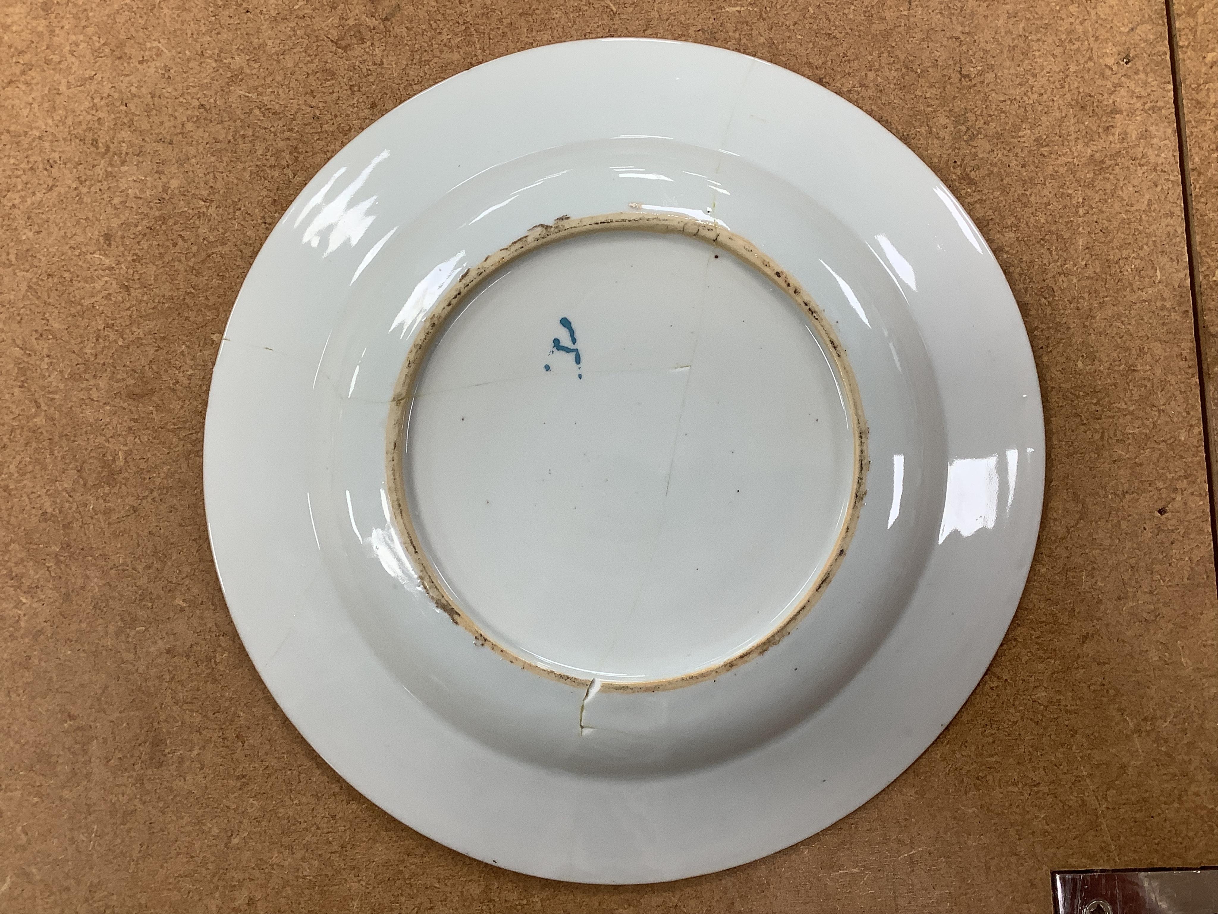 Three Chinese famille rose plates, Qianlong, including an armorial example, largest 22.5cm in diameter